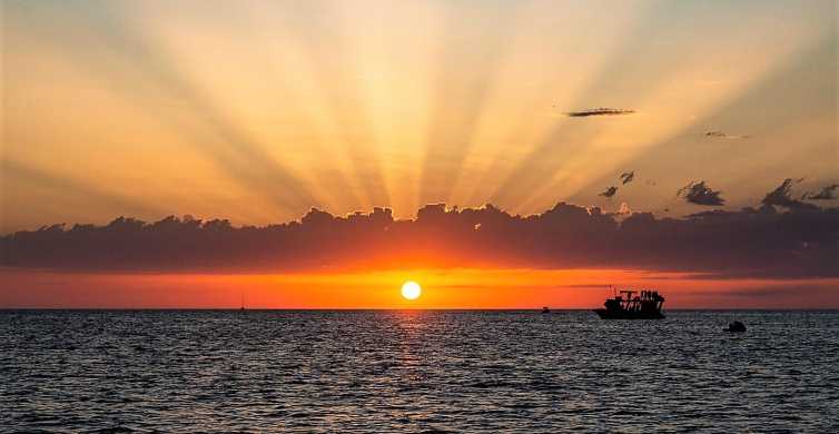 Ibiza: crucero al atardecer con esnórquel y cuevas