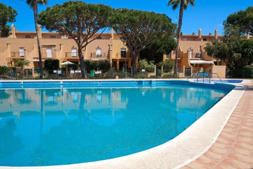 Adosado con jardín y piscina en Chiclana Barrosa-Sancti Petri