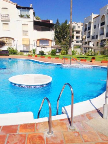 Alojamiento Playa Granada Motril,piscina,vistas al mar,jardines,playas,campo golf,surf