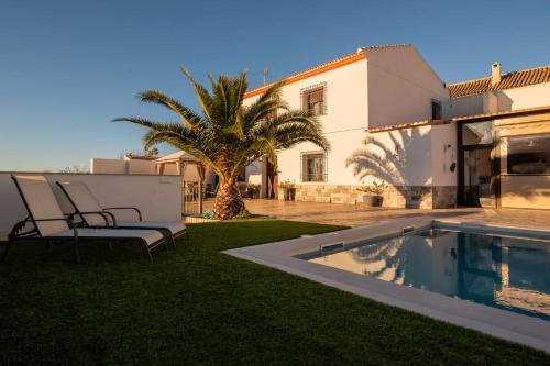 Lujoso chalet en el centro de Andalucía Con barbacoa y chimenea exterior