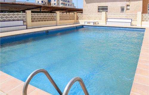 Amazing apartment in Cabo de Palos with Outdoor swimming pool, Internet and 3 Bedrooms