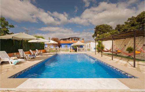 Amazing home in Guillena with Outdoor swimming pool, WiFi and 5 Bedrooms