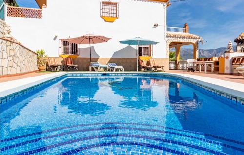 Amazing home in Torrox with Outdoor swimming pool, WiFi and 5 Bedrooms