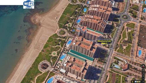Apartamento 1ª Línea de mar en Marina d Or con césped y playa [Familiar]