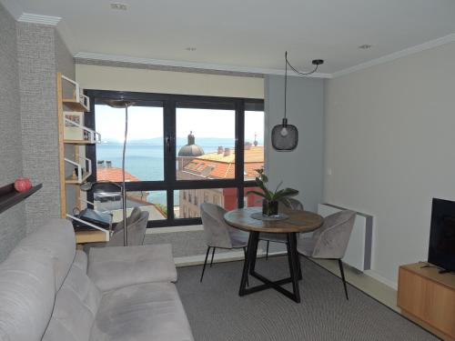 Apartamento con vistas al mar y playa enfrente