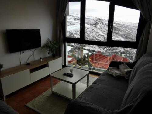 Apartamento en Sierra Nevada, próximo a pistas y plaza central, vistas increíbles