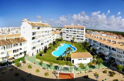 3 bedrooms appartement with city view shared pool and terrace at El Portil 1 km away from the beach