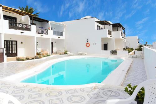 2 bedrooms appartement at Tias 500 m away from the beach with shared pool garden and wifi