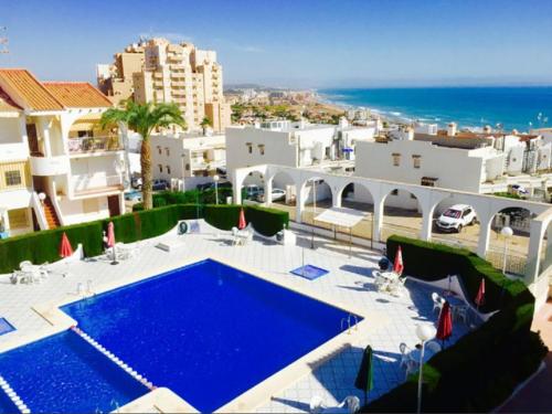 Apartment with pool & balcony less than 10min walk to La Mata Beach!