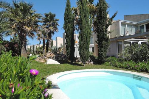 Apartment in La Escala with garden furniture