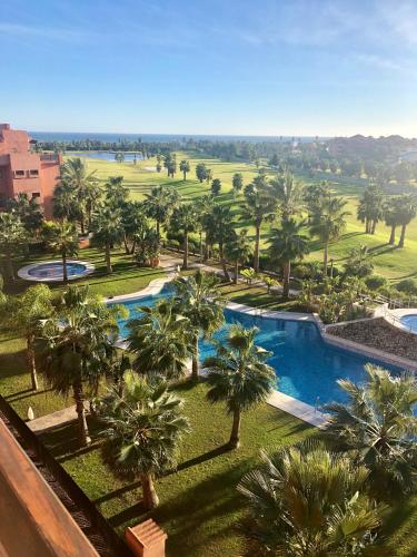 Ático Playa Granada Golf + Piscina con jacuzzi