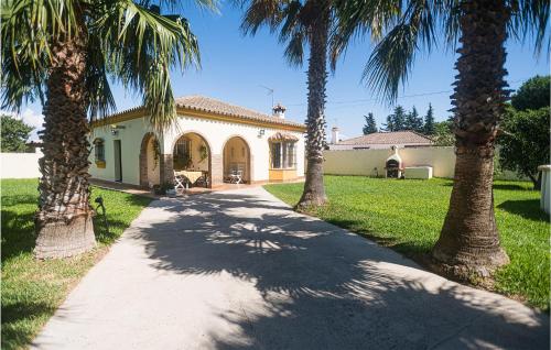 Awesome home in Chiclana de la Fronter with Outdoor swimming pool, WiFi and 3 Bedrooms