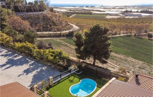 Awesome home in Motril with WiFi, Outdoor swimming pool and 4 Bedrooms
