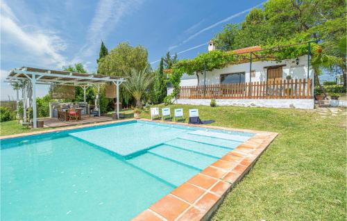 Awesome home in Sevilla with Outdoor swimming pool and 4 Bedrooms