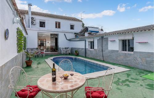 Awesome home in Trasmulas, Pinos Puent with 5 Bedrooms