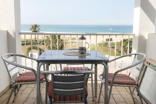 Beach apartment & terrace with panoramic sea view.