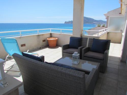 Beach front line penthouse in Altea