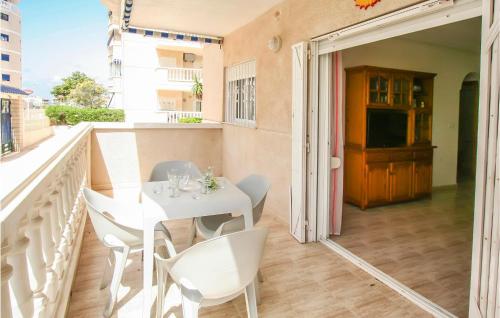 Beautiful apartment in Los Arenales del Sol with Outdoor swimming pool and 1 Bedrooms