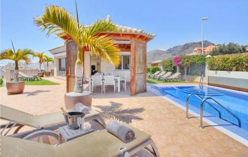 Beautiful home in Santiago del Teide with Outdoor swimming pool, WiFi and 4 Bedrooms