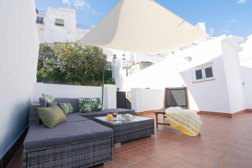 Casa con terraza y patio privado en el casco antiguo de Salobreña