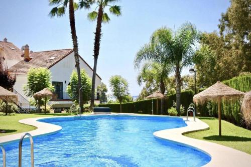 Chalet adosado frente al mar con piscina, Benalmadena-Costa