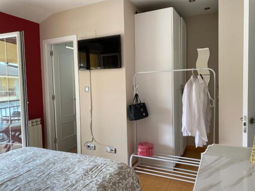 Habitación con baño privado en casa del Anfitrión