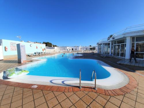 2 bedrooms house with shared pool jacuzzi and furnished terrace at Maspalomas 1 km away from the beach