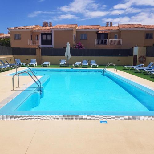 2 bedrooms house with sea view shared pool and furnished terrace at Corralejo