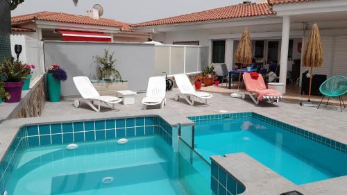 4 bedrooms house with private pool enclosed garden and wifi at San Bartolome de Tirajana