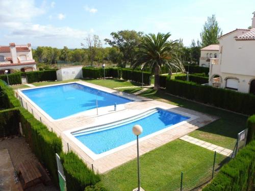 3 bedrooms house with shared pool and enclosed garden at Miami Platja 3 km away from the beach