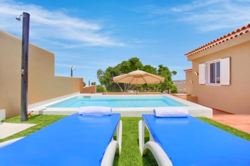 3 bedrooms house with sea view private pool and enclosed garden at Guia de Isora 2 km away from the beach