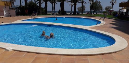 Appartement Première Ligne de mer avec piscine