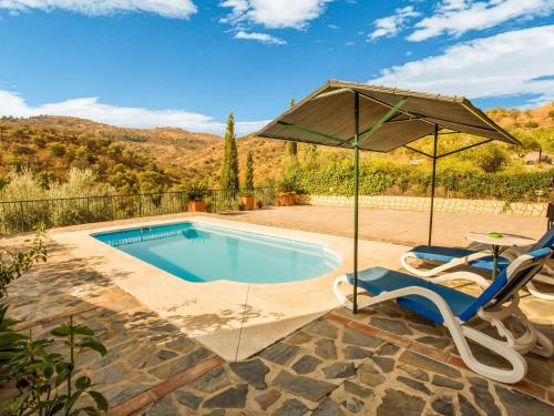 Classy Holiday Home in Guaro with Private Swimming Pool