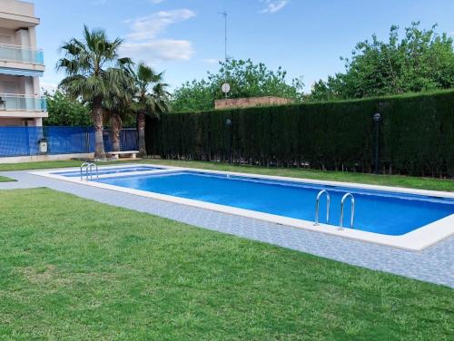 Luminoso apartamento con piscina en Playa Morro de Gos