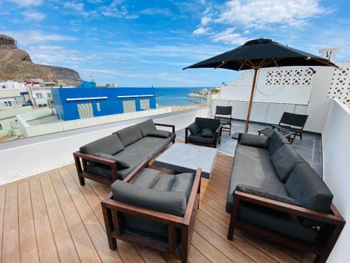 luxury penthouse with ocean and beach views in Puerto de Mogan