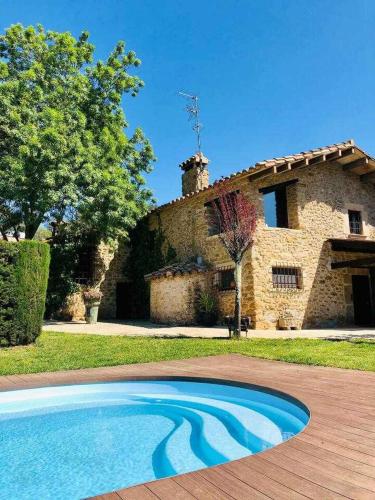 Masia with pool and beautiful views near Girona