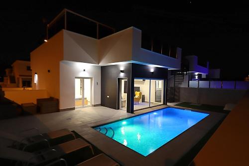 New villa with rooftop terrace and pool