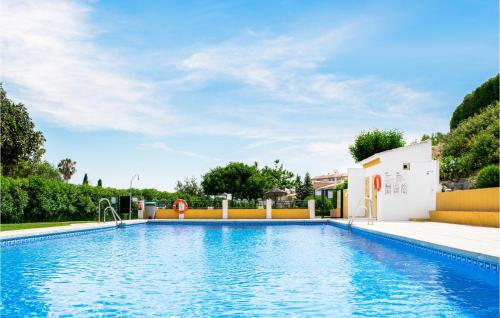 Nice apartment in El Faro with Outdoor swimming pool, WiFi and 2 Bedrooms