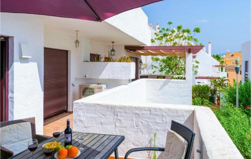 Nice apartment in Marbella with Outdoor swimming pool, Heated swimming pool and 2 Bedrooms