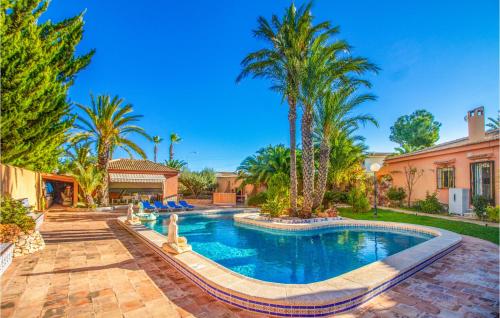 Nice home in El Chaparral with WiFi, Outdoor swimming pool and 2 Bedrooms