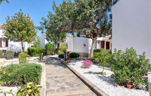 Nice home in El Coronil with Outdoor swimming pool, WiFi and 2 Bedrooms