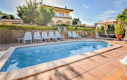 Nice home in Lloret de Mar with Outdoor swimming pool, WiFi and 4 Bedrooms