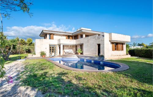 Nice home in Marratxí with WiFi, Outdoor swimming pool and 4 Bedrooms