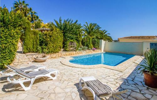 Nice home in Teulada with Outdoor swimming pool, WiFi and 5 Bedrooms