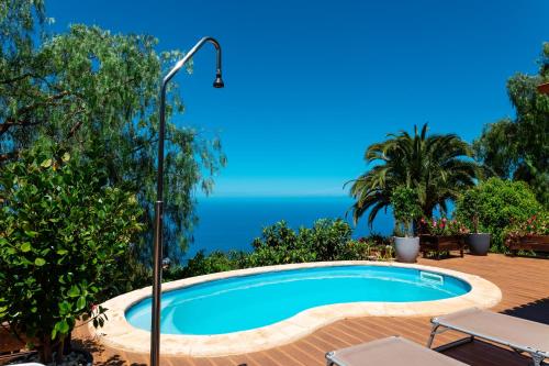 One bedroom villa with sea view private pool and furnished garden at Tijarafe