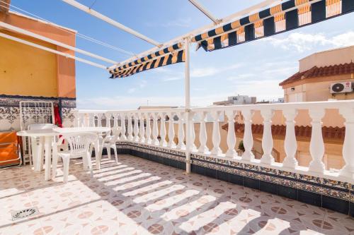 Few meters from La Mata beach, top-floor with big terrace