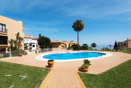 Piso Benalmádena Pueblo con vista, piscina y tranquilidad