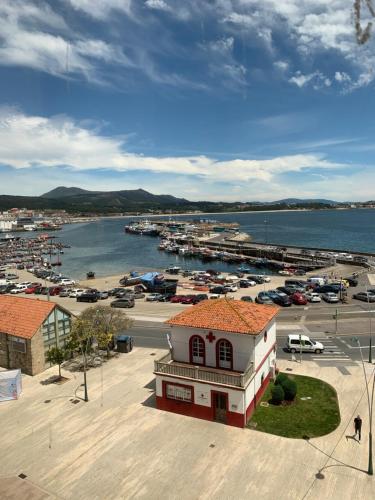 Piso en el malecón de Riveira con vistas a las Rias Baixas. Ideal para familias. 140m