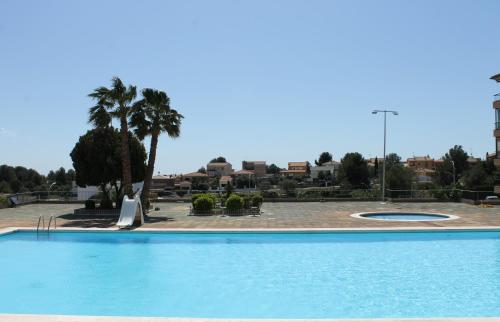 Suitur Apartment Ohana with 2 swimming pool. Views of the Castle in Calafell