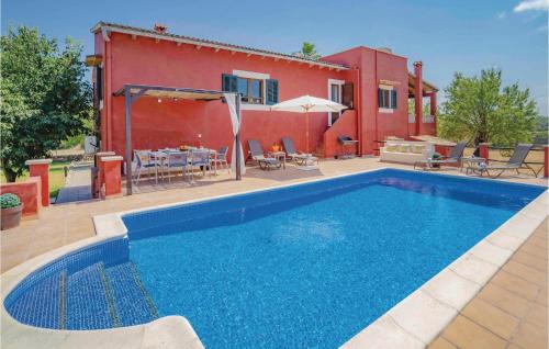 Three-Bedroom Holiday Home in Port d Alcudia